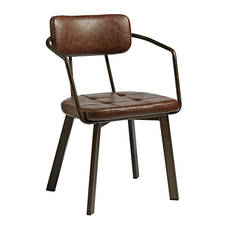 The AUZET armchair features an angular frame manufactured from old anvil steel. Seat pad and back rest upholstered in a vintage faux leather. 