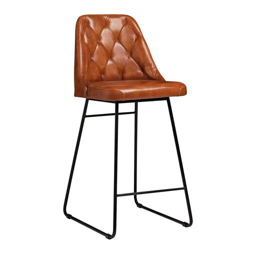 Classic design bar stool
The HARLAND Collection includes a side chair and bar stool ? manufactured from beautiful Genuine Bruciato Leather in a quilted design with a sled frame in solid metal. 