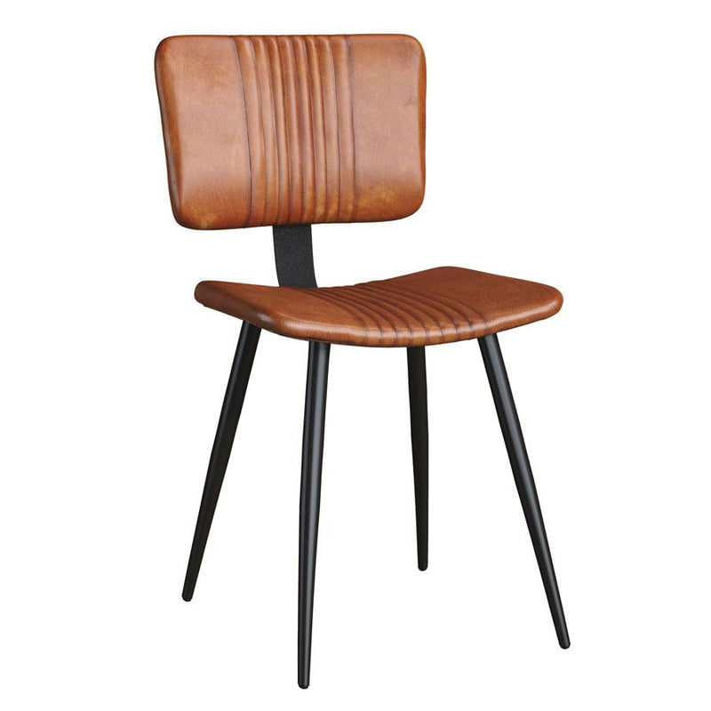 Vintage leather chair
Contemporary chair with a vintage feel, upholstered in an aged, genuine Bruciato leather and featuring tubular steel legs.